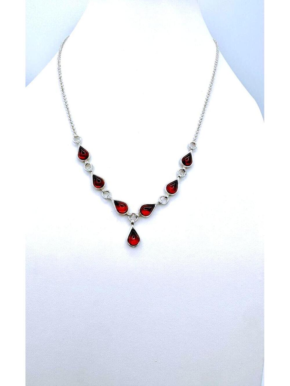KCN sterling silver necklace with 7, 0.375", amber tear drop shape silver links